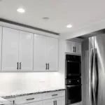 The Image Showcases A Modern Kitchen Transformation Featuring Sleek Cabinet Pulls And Stylish Light Fixtures, Highlighting The Impact Of Home Improvements On The Overall Aesthetic. Such Updates Can Significantly Enhance A Home'S Curb Appeal And Attract Potential Buyers, Making It More Appealing In The Competitive Real Estate Market.