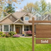 Suburban Home With A Real Estate Sign In Columbia, Mo During The April 2026 Spring Housing Market